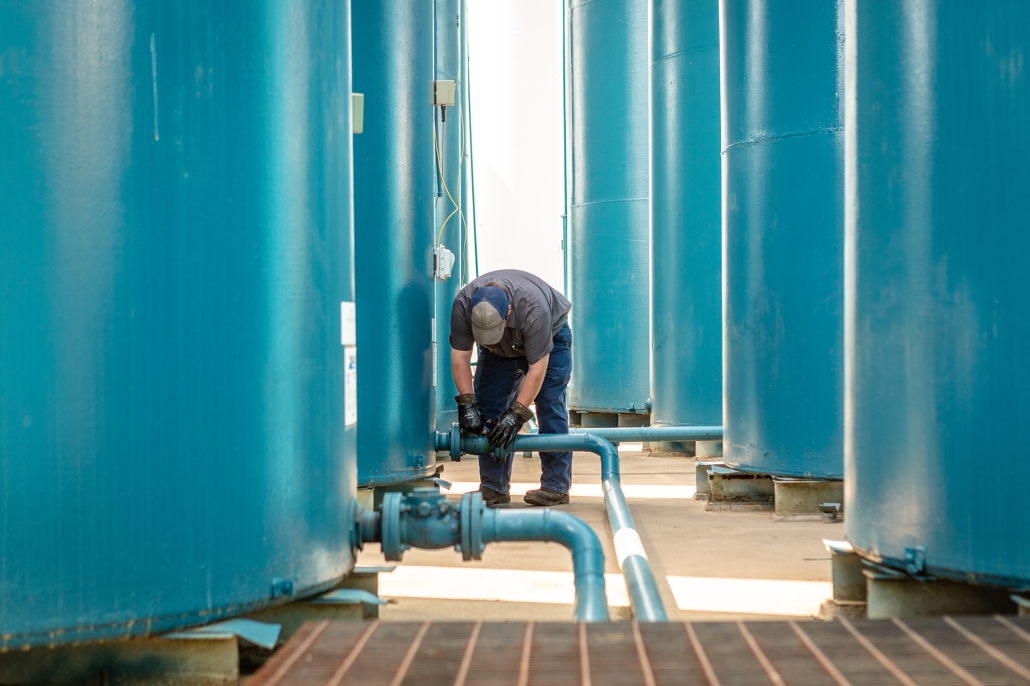 Technician working on Gasoline, Diesel & Kerosene fuel tanks and pipes.
