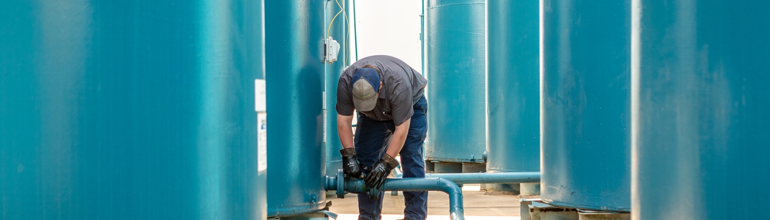 Technician working on Gasoline, Diesel & Kerosene fuel tanks and pipes.