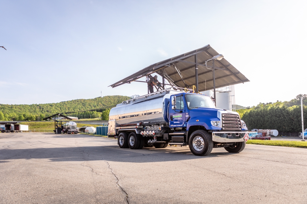 Hutchens Rentz-Eden tank truck filling up with diesel at fuel station