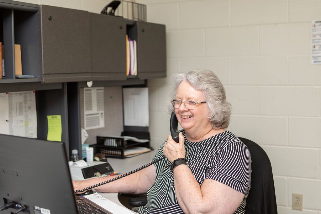 Copy of Hutchens(199) customer service representative helping gasoline customer with online portal.