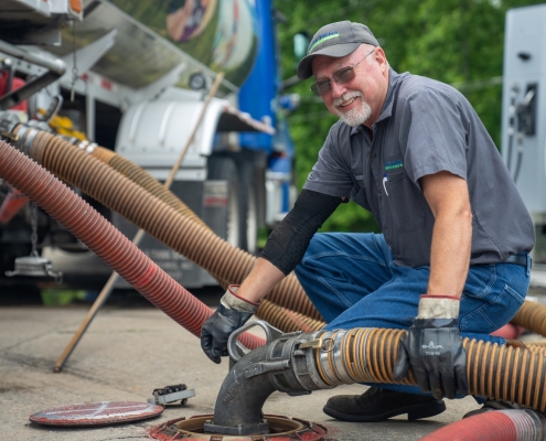 Fuel technician delivering fuel to a commercial business.