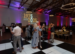 Group dancing at Hutchens 50th Anniversary Event