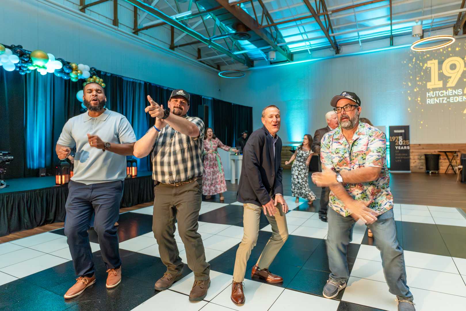 Group dancing at Hutchens 50th Anniversary Event