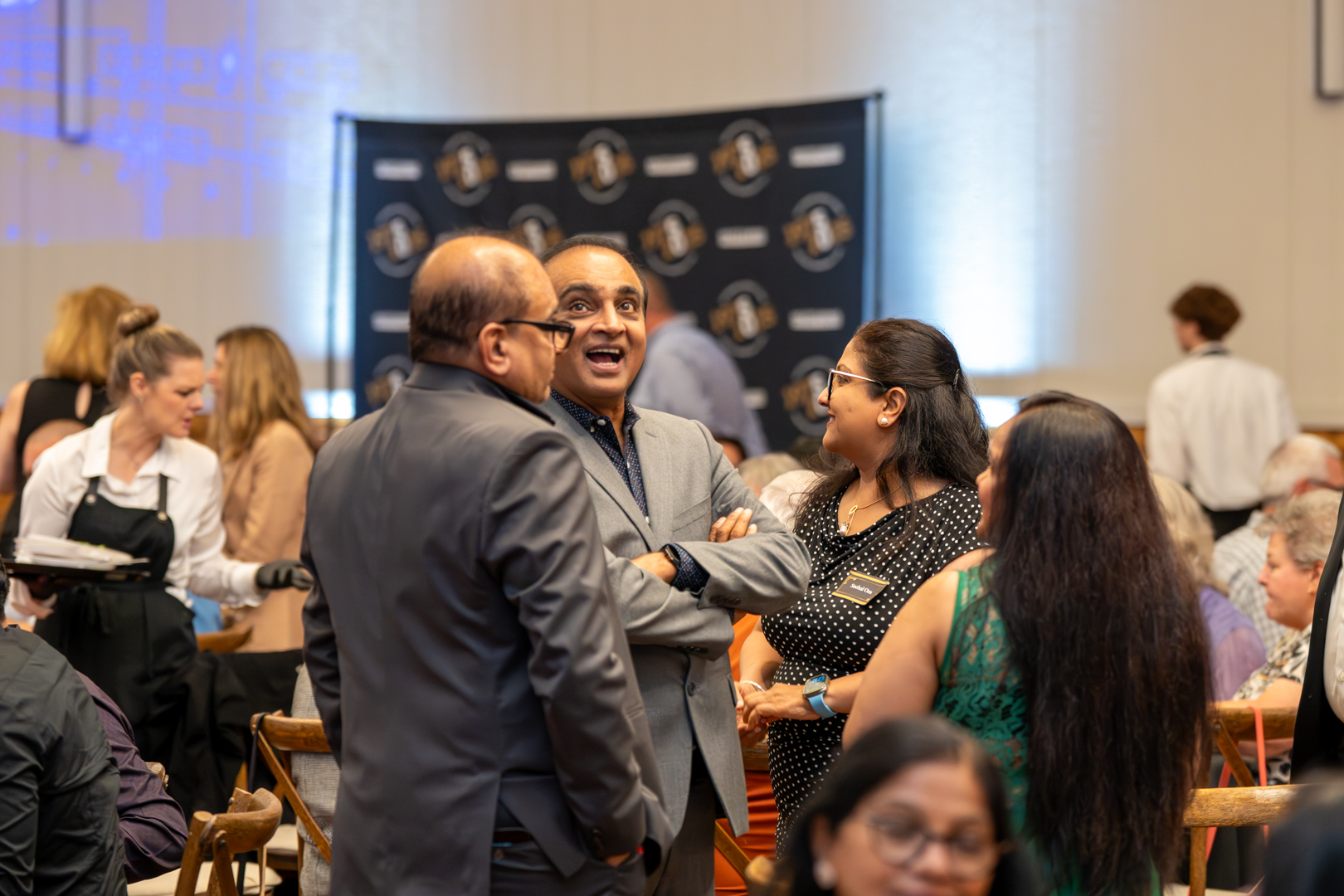 Group dancing at Hutchens 50th Anniversary Event