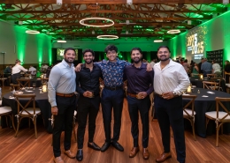 Posing for a photo at Hutchens 50th Anniversary Event