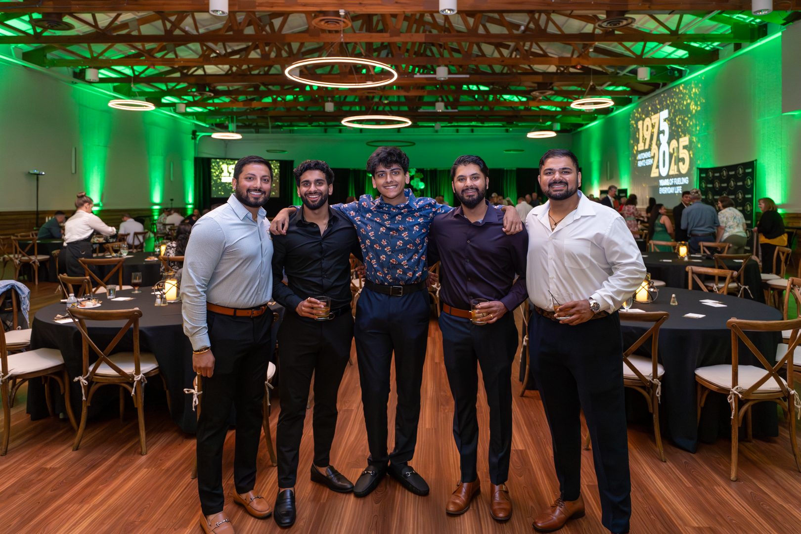 Posing for a photo at Hutchens 50th Anniversary Event