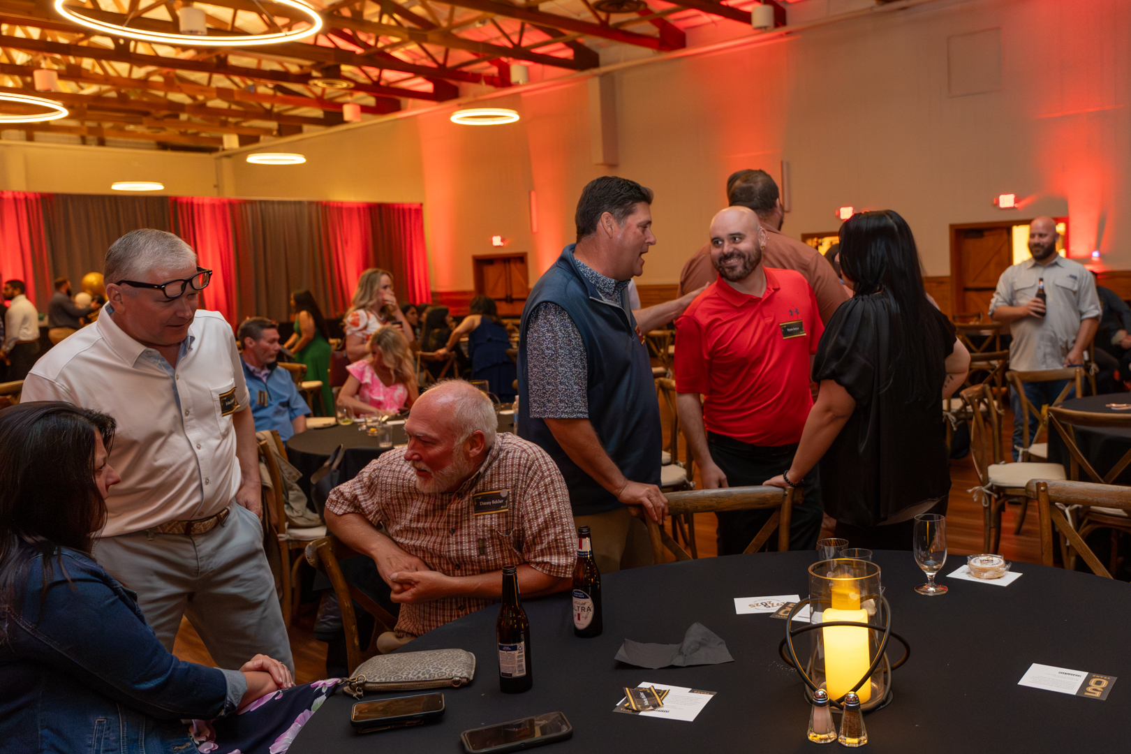 Group chatting at Hutchens 50th Anniversary Event