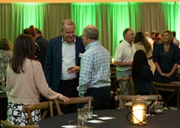 Group chatting at Hutchens 50th Anniversary Event