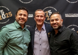 Posing for a photo at Hutchens 50th Anniversary Event