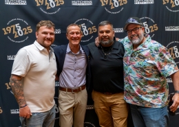 Posing for a photo at Hutchens 50th Anniversary Event