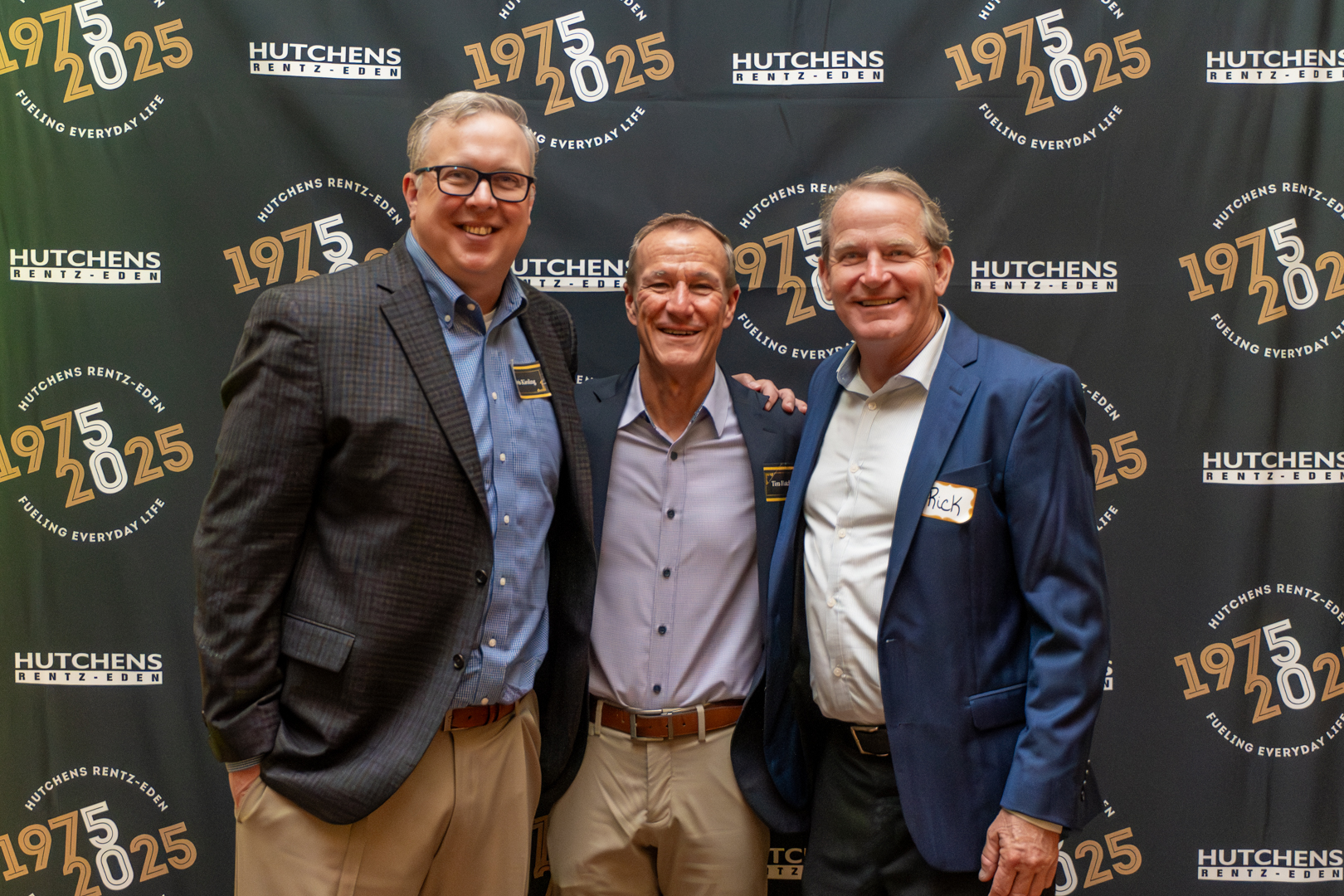 Posing for a photo at Hutchens 50th Anniversary Event