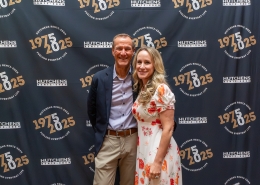 Posing for a photo at Hutchens 50th Anniversary Event