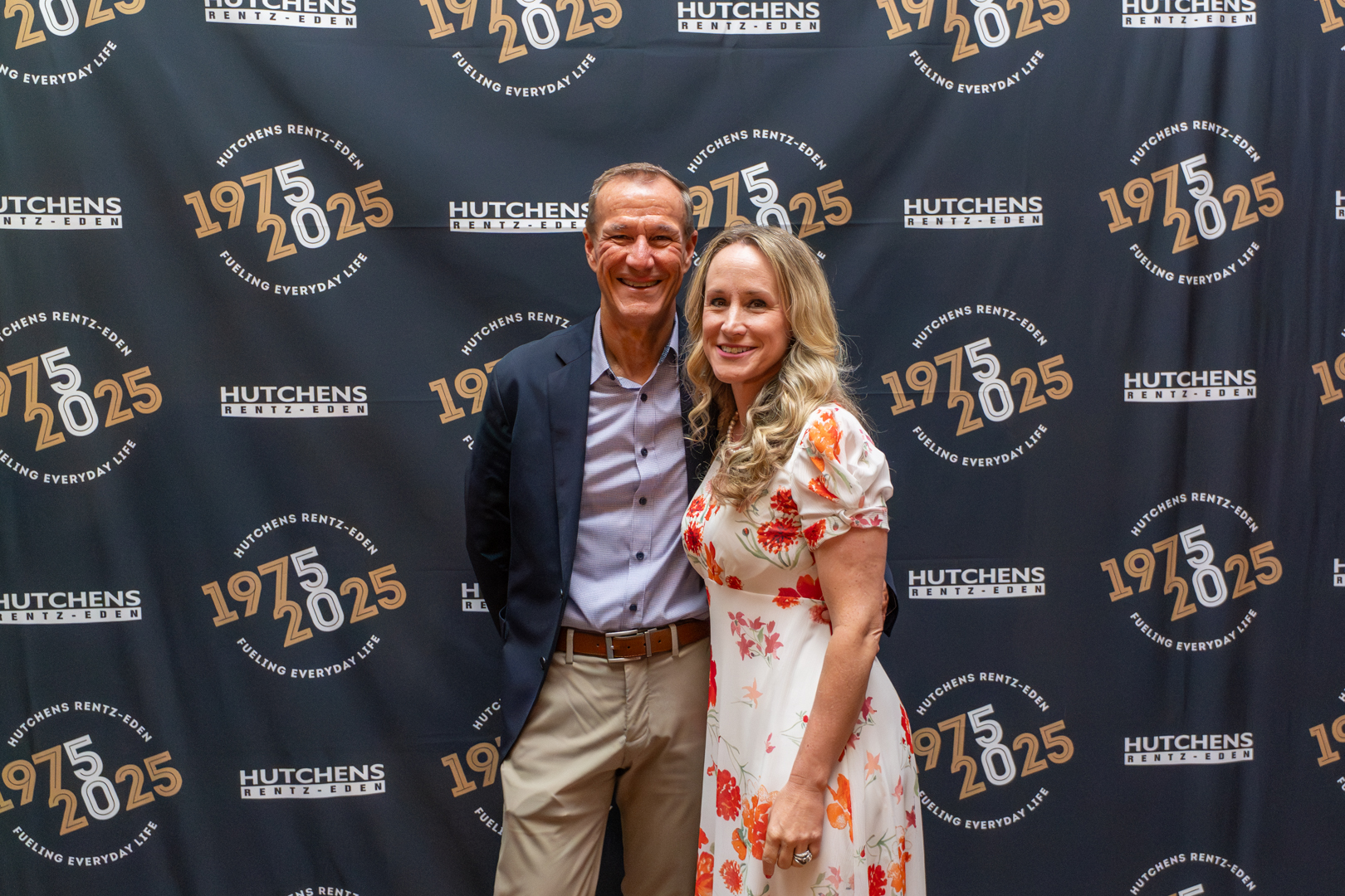 Posing for a photo at Hutchens 50th Anniversary Event