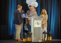 Accepting an award at Hutchens 50th Anniversary Event