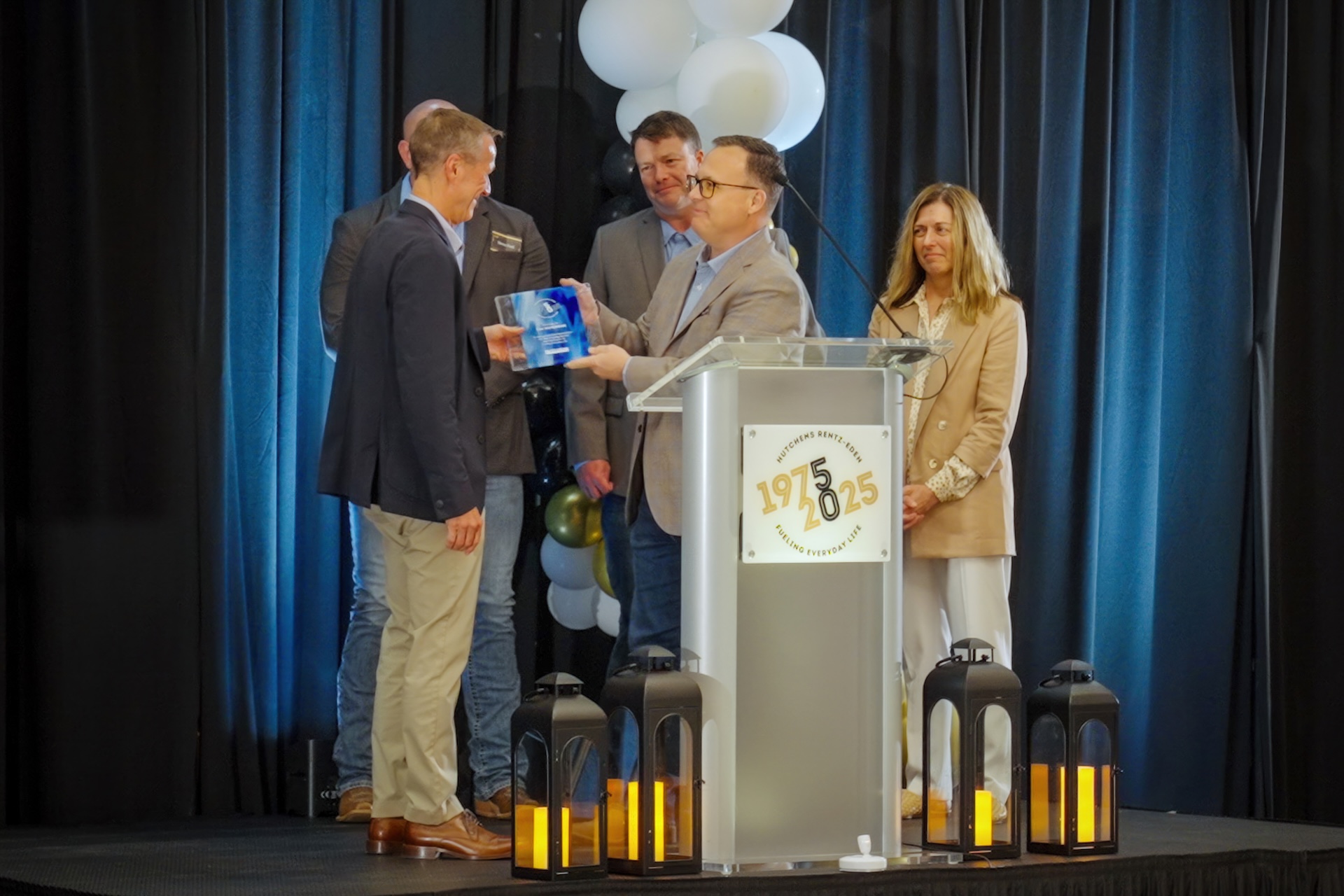 Accepting an award at Hutchens 50th Anniversary Event