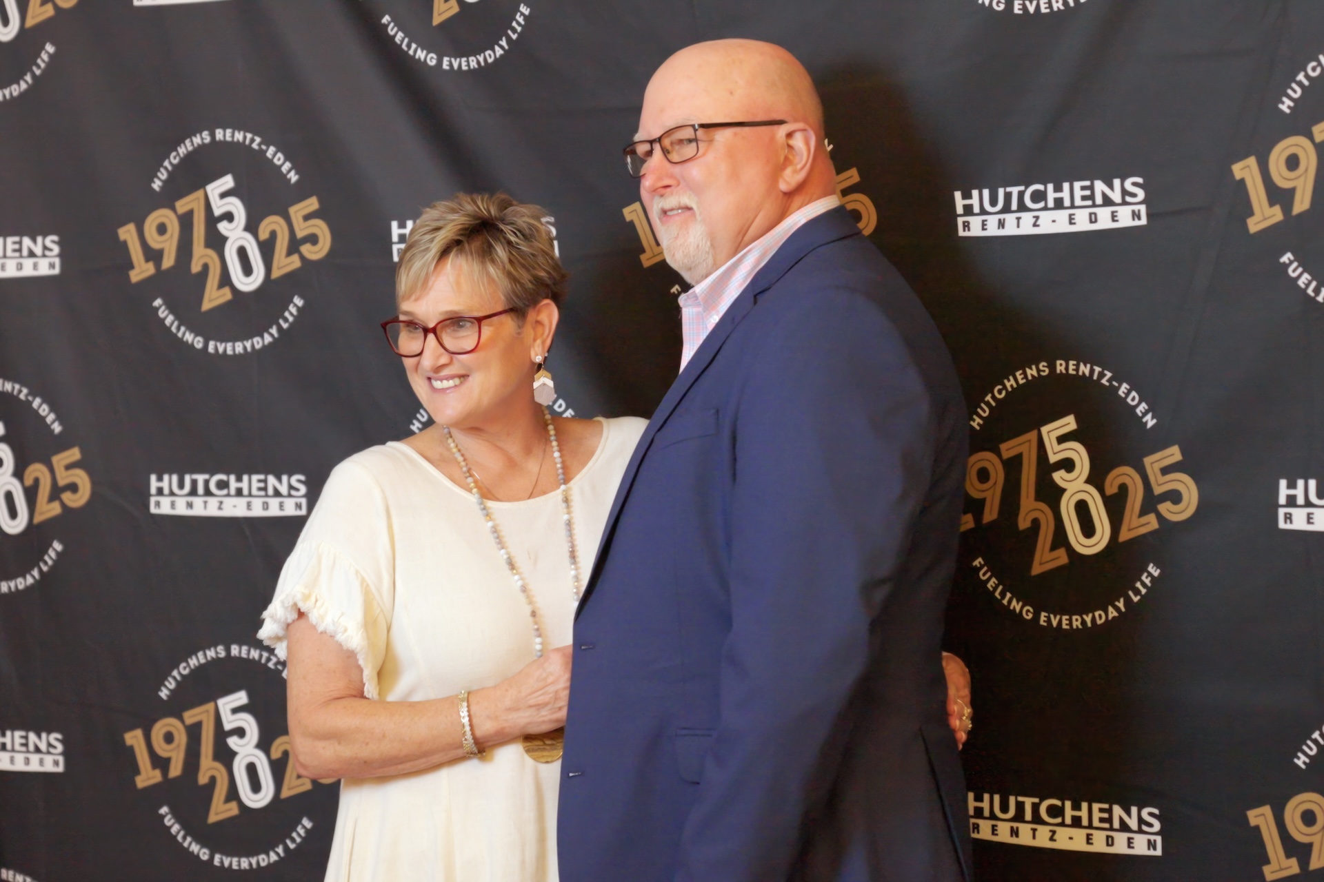 Posing for a photo at Hutchens 50th Anniversary Event