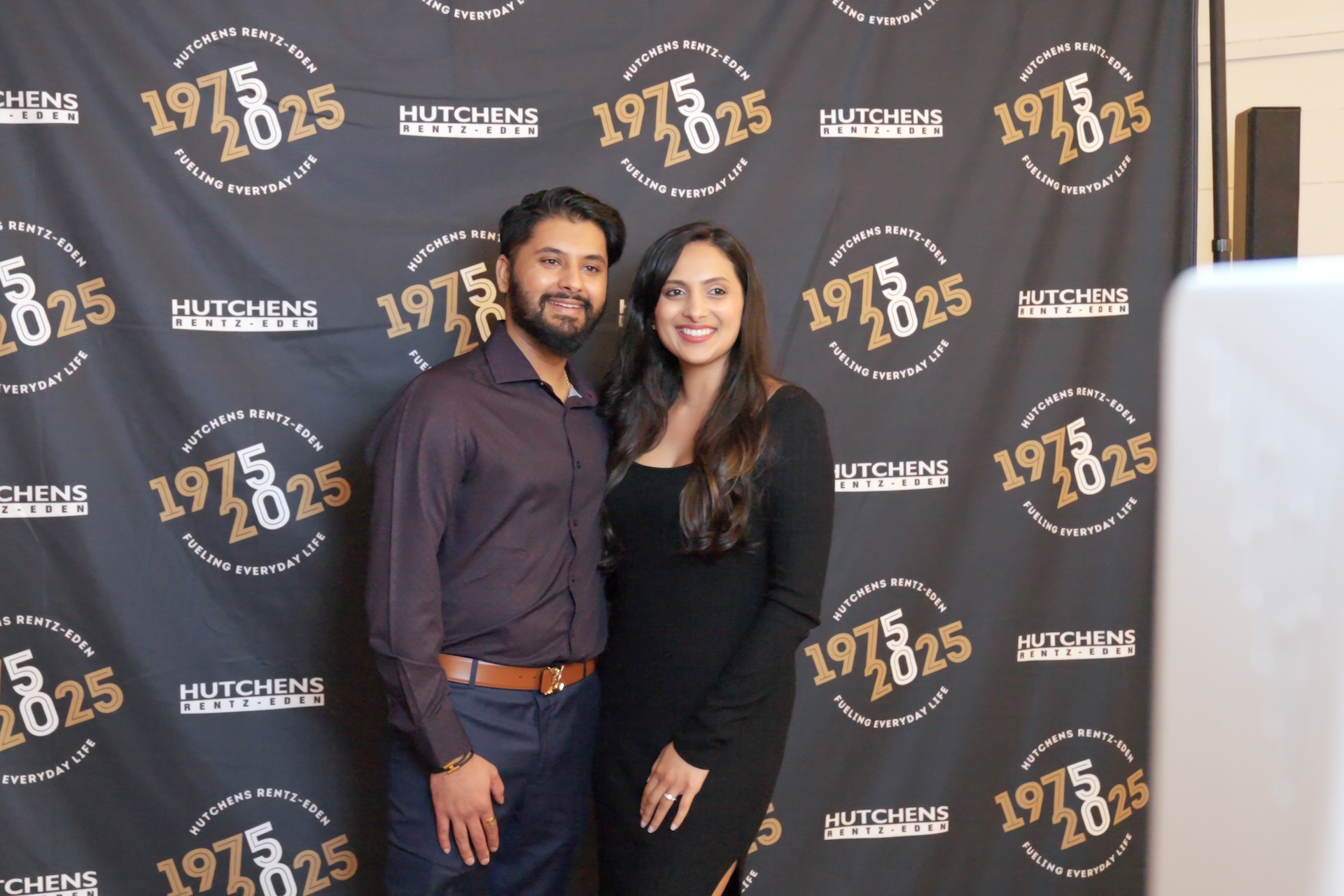 Posing for a photo at Hutchens 50th Anniversary Event