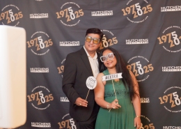 Posing for a photo at Hutchens 50th Anniversary Event