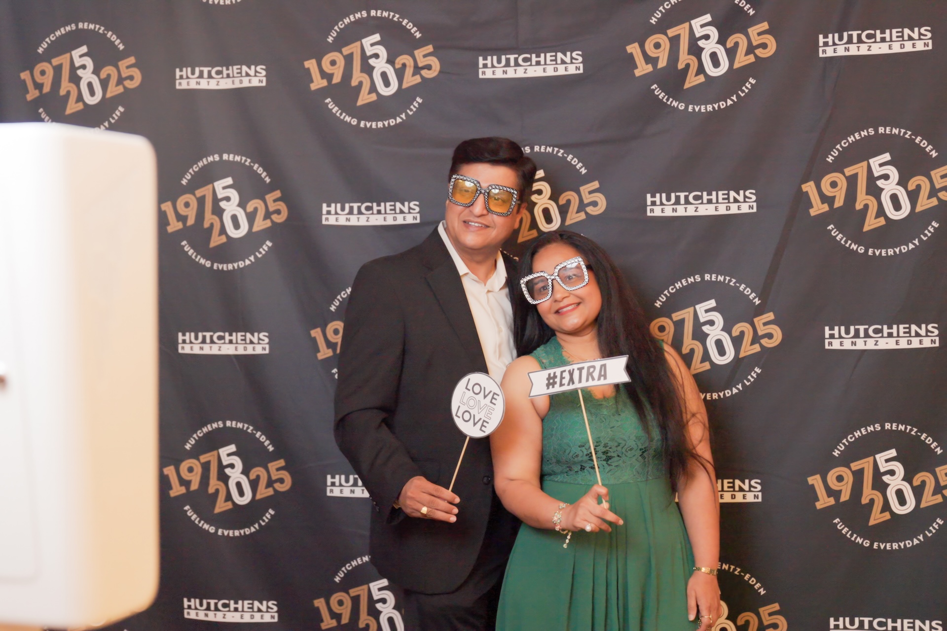 Posing for a photo at Hutchens 50th Anniversary Event