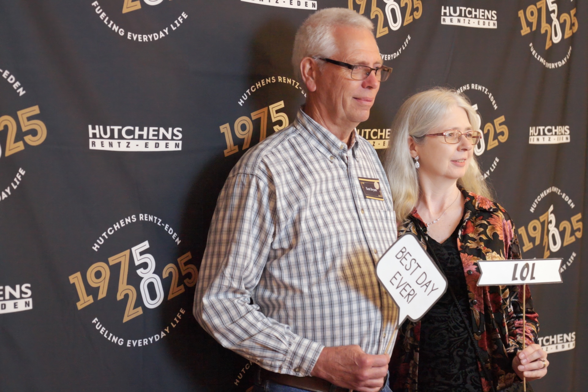 Posing for a photo at Hutchens 50th Anniversary Event