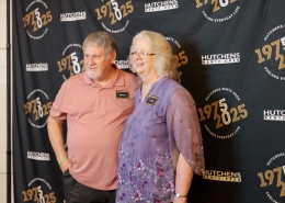 Posing for a photo at Hutchens 50th Anniversary Event