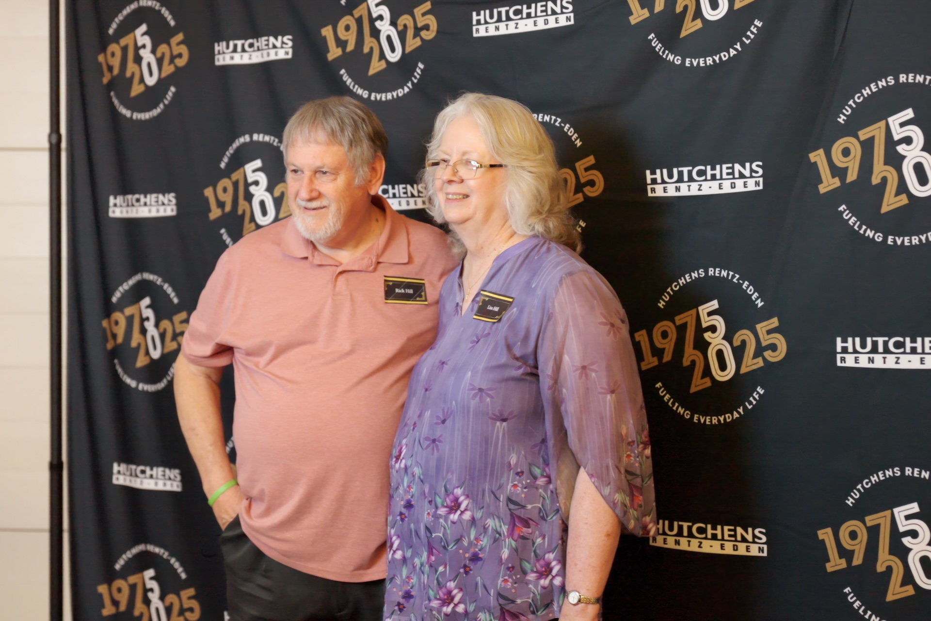 Posing for a photo at Hutchens 50th Anniversary Event